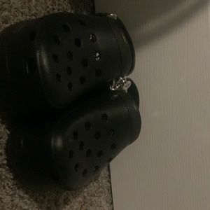 Platform Crocs. new, black in size 9.